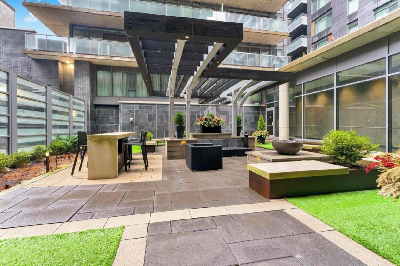 Outdoor courtyard lounge and seating area at the building
