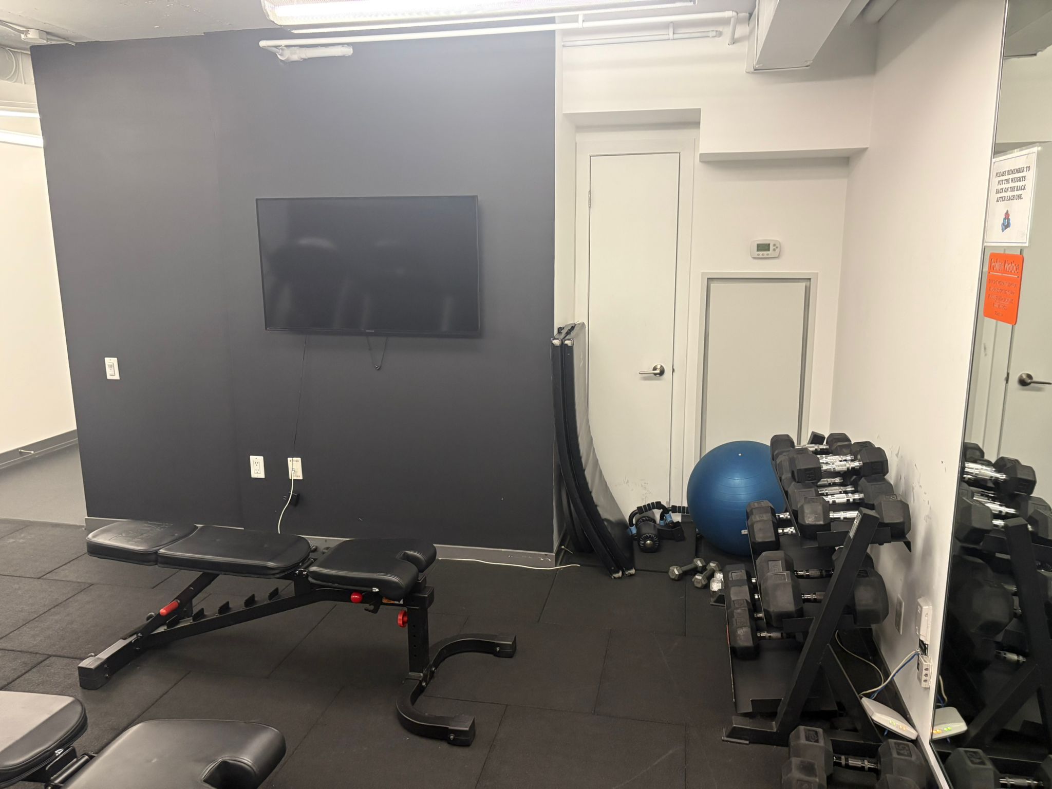 Workout bench and training zone in the building gym
